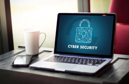 Laptop computer with "cyber security" image on screen
