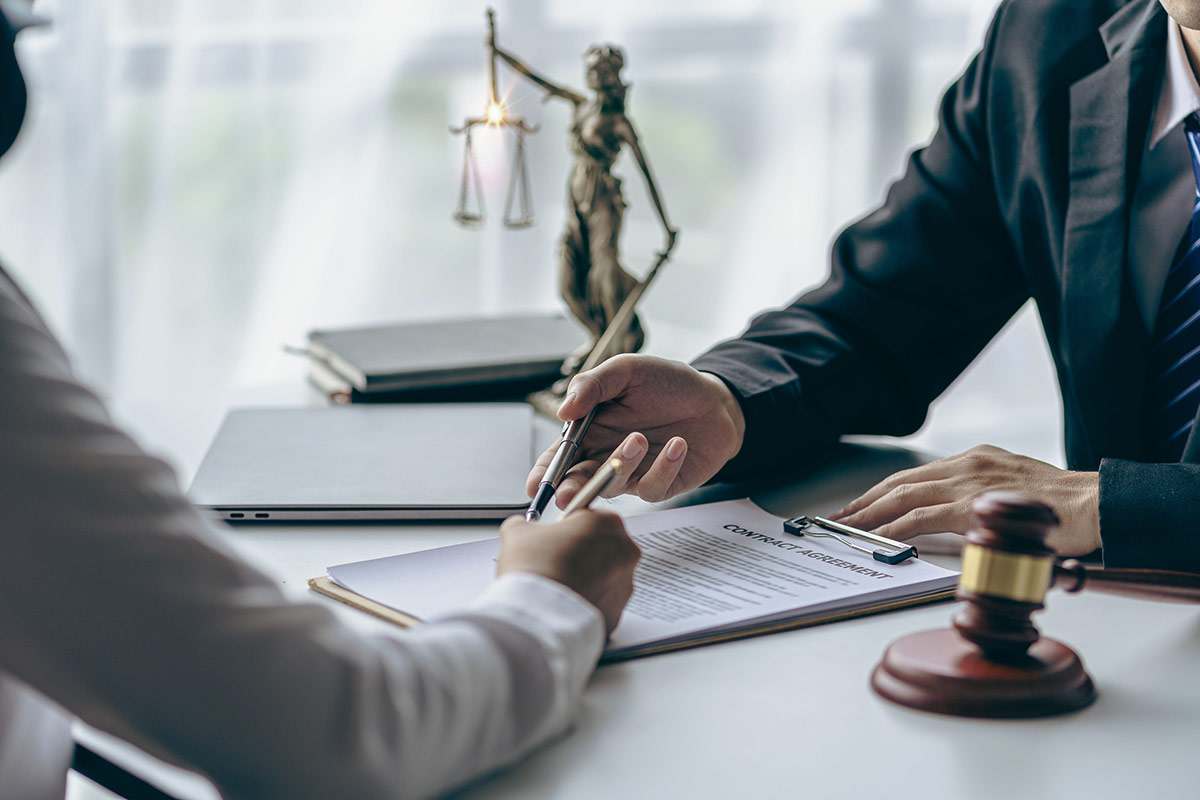 a law professional in a meeting with their client